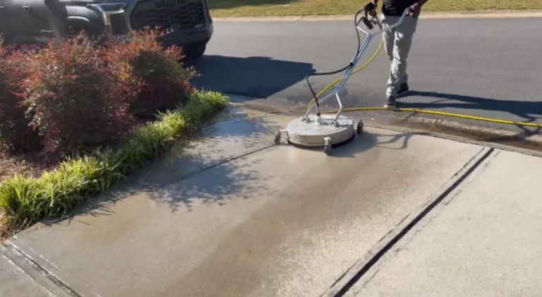Driveway being pressure washed beside the road in Wesley Chapel, FL