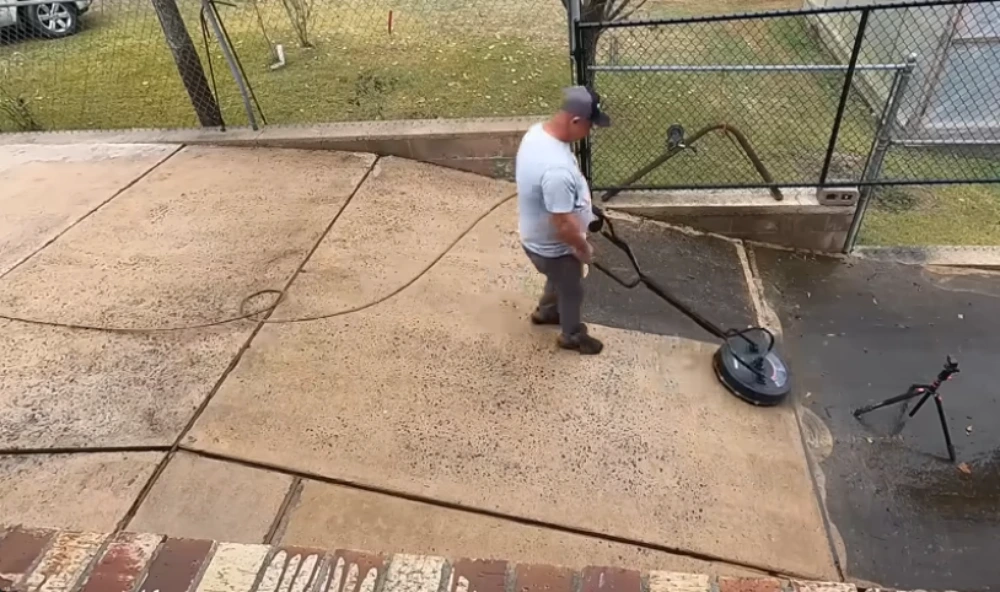 Wiregrass Ranch driveway cleaning near entrance monument Pressure washing Wiregrass Ranch FL driveway near community entrance