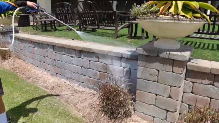 Boundary wall cleaning on a golf course facing Lexington Oaks property